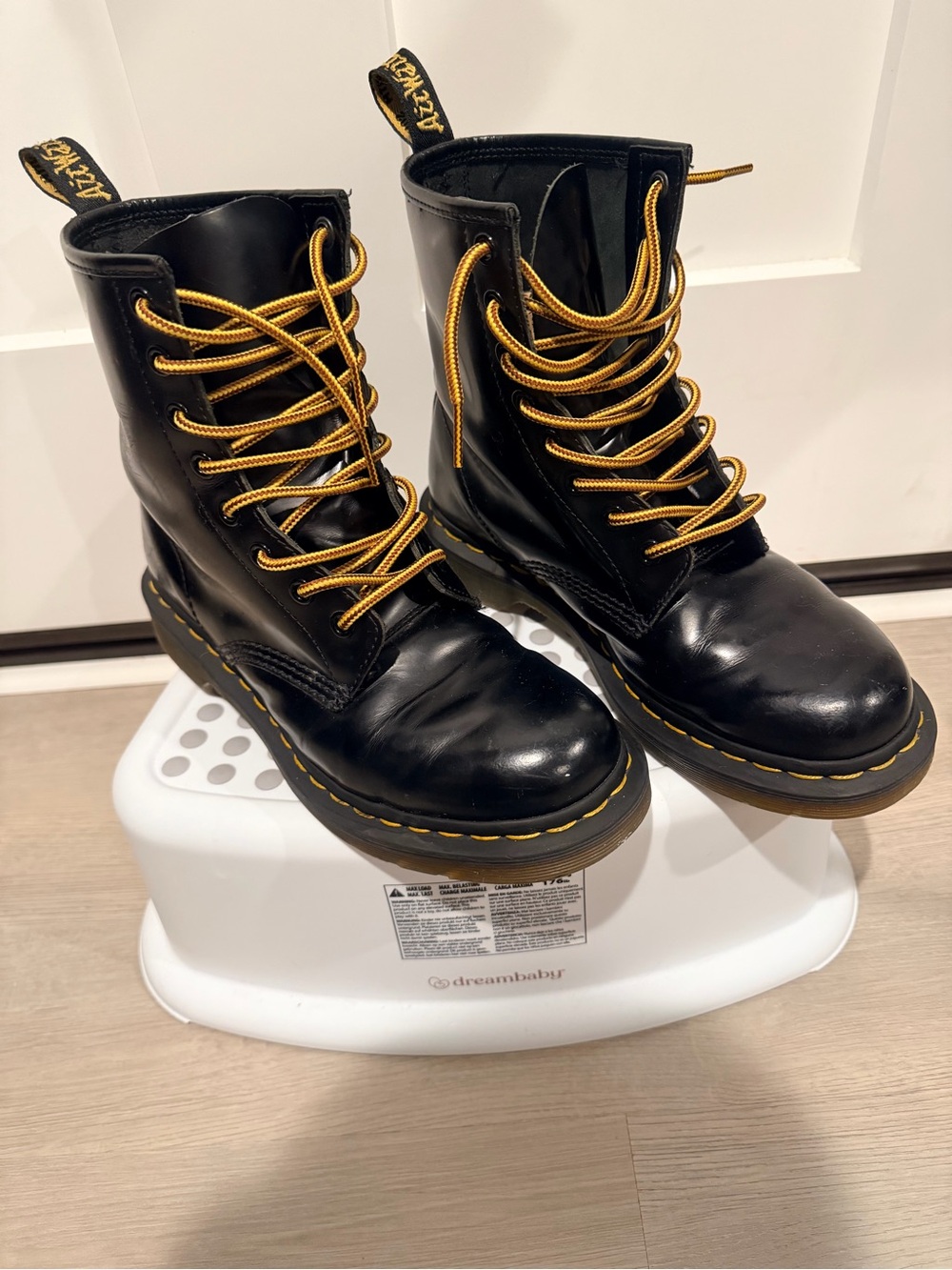 Dr. Martens Black Leather Combat Boots with Yellow Laces
